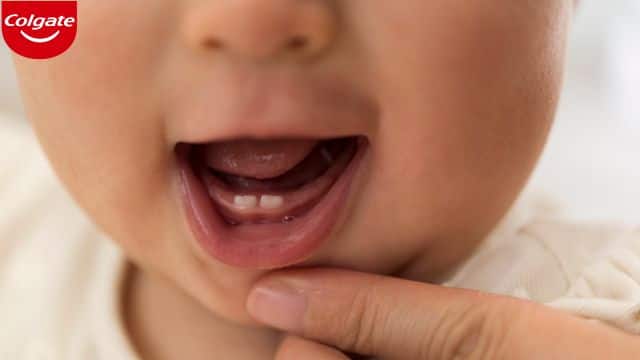 cách nhận biết trẻ mọc răng - colgate